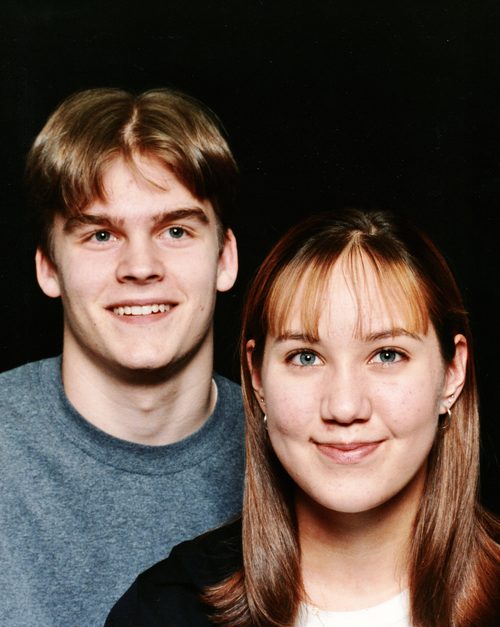 Michael and Raichelle as teenagers in a studio portrait